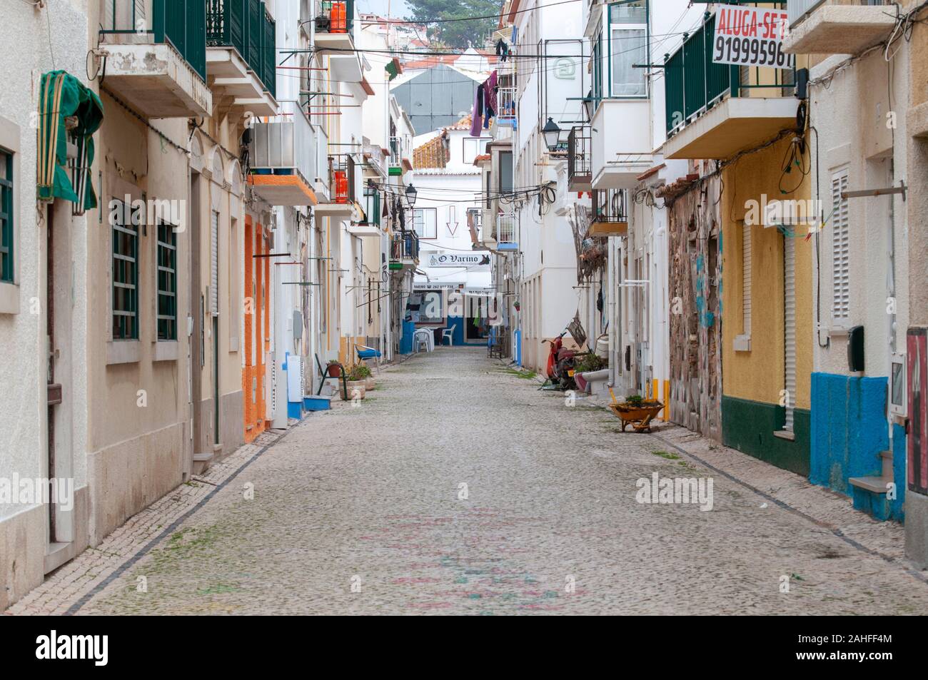 Narrow alley in the old town (Praia) of Nazare, Portugal Stock Photo