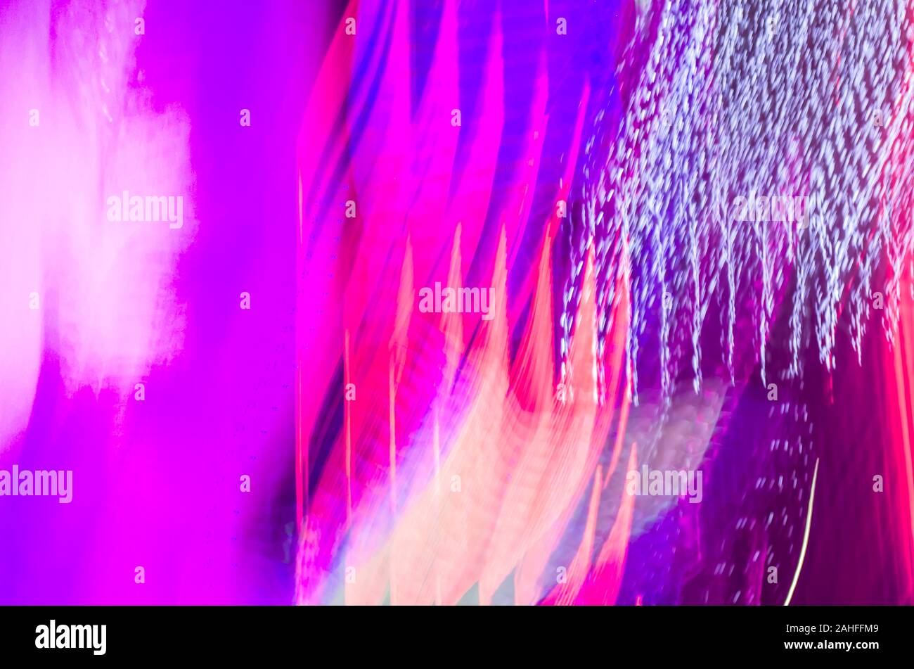 Blurred photo of neon lights. Abstract background Stock Photo - Alamy