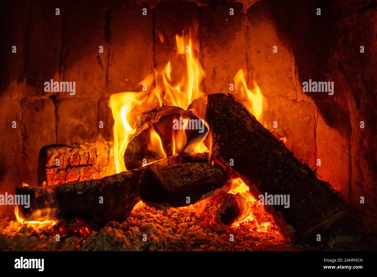 Fire In A Fireplace With Logs And Flames Stock Photo 337789105