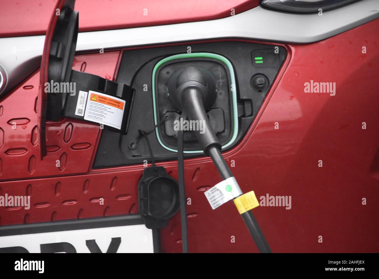 Electric car charging point sign Stock Photo Alamy