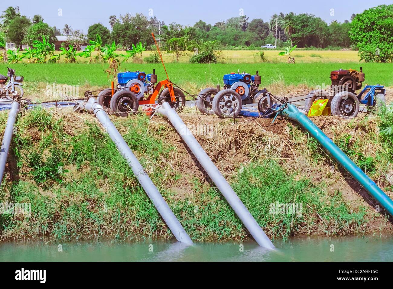 Row of water pump on trailer used to pump water from irrigation canal