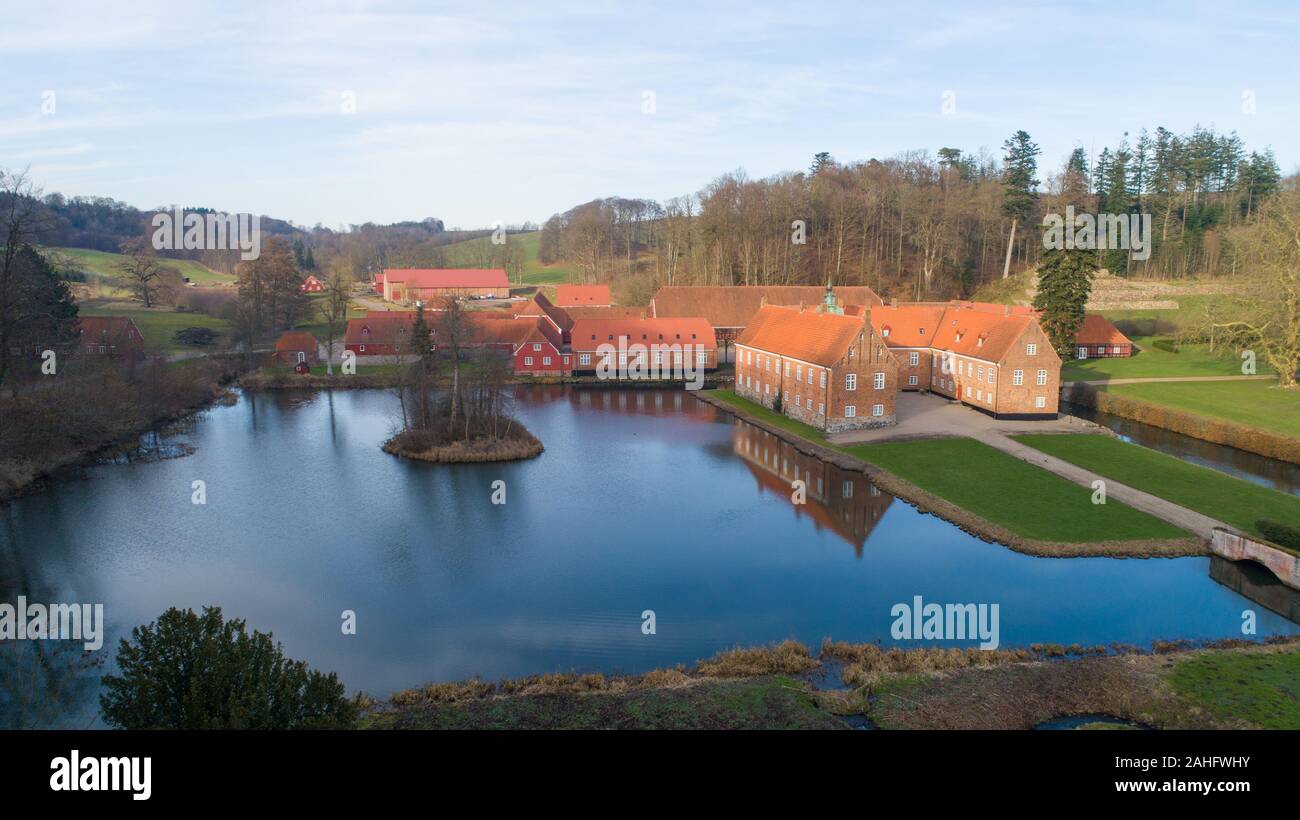 Aerial photo of Tirsbaek Manor north of Vejle Fjord in Jutland, Denmark. The main building dates back to the 1550s. Stock Photo