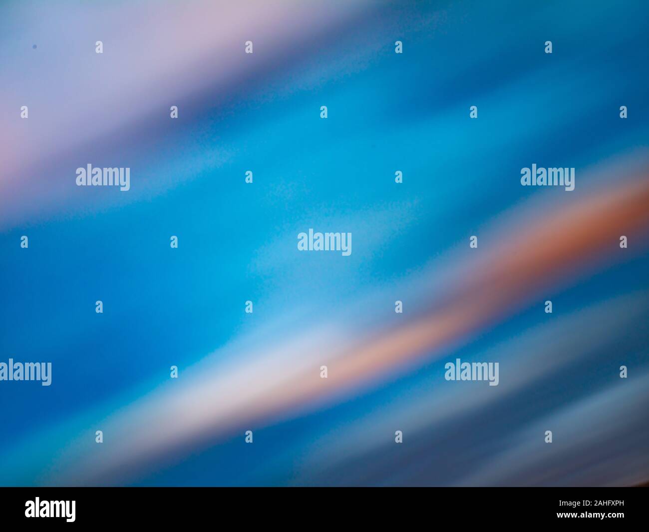 A Blurry Blue Sunset Sky On A Diagonal Axis Stock Photo