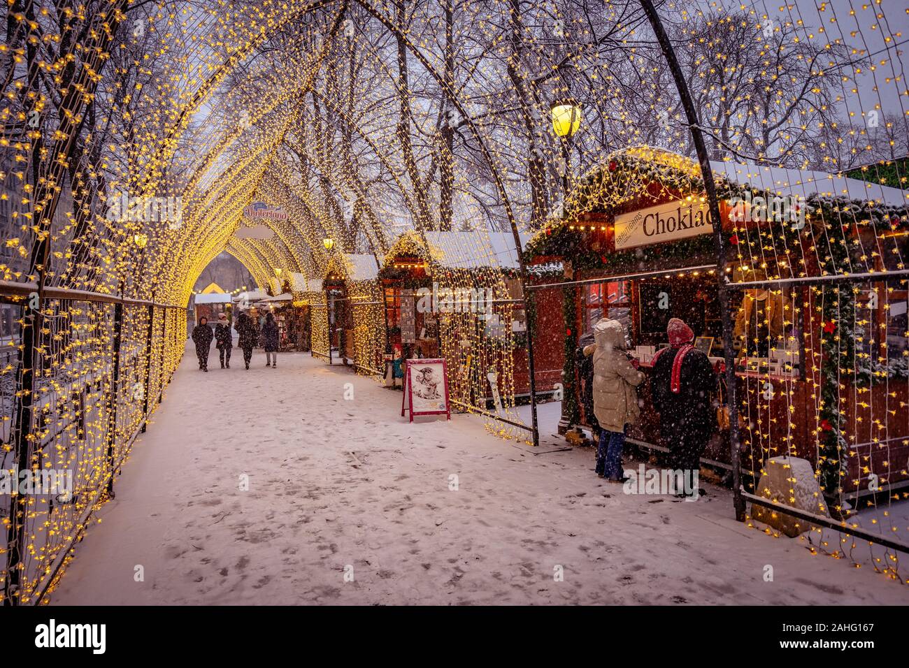 Oslo, Norway - Traditional Christmas market with falling snow Stock Photo -  Alamy