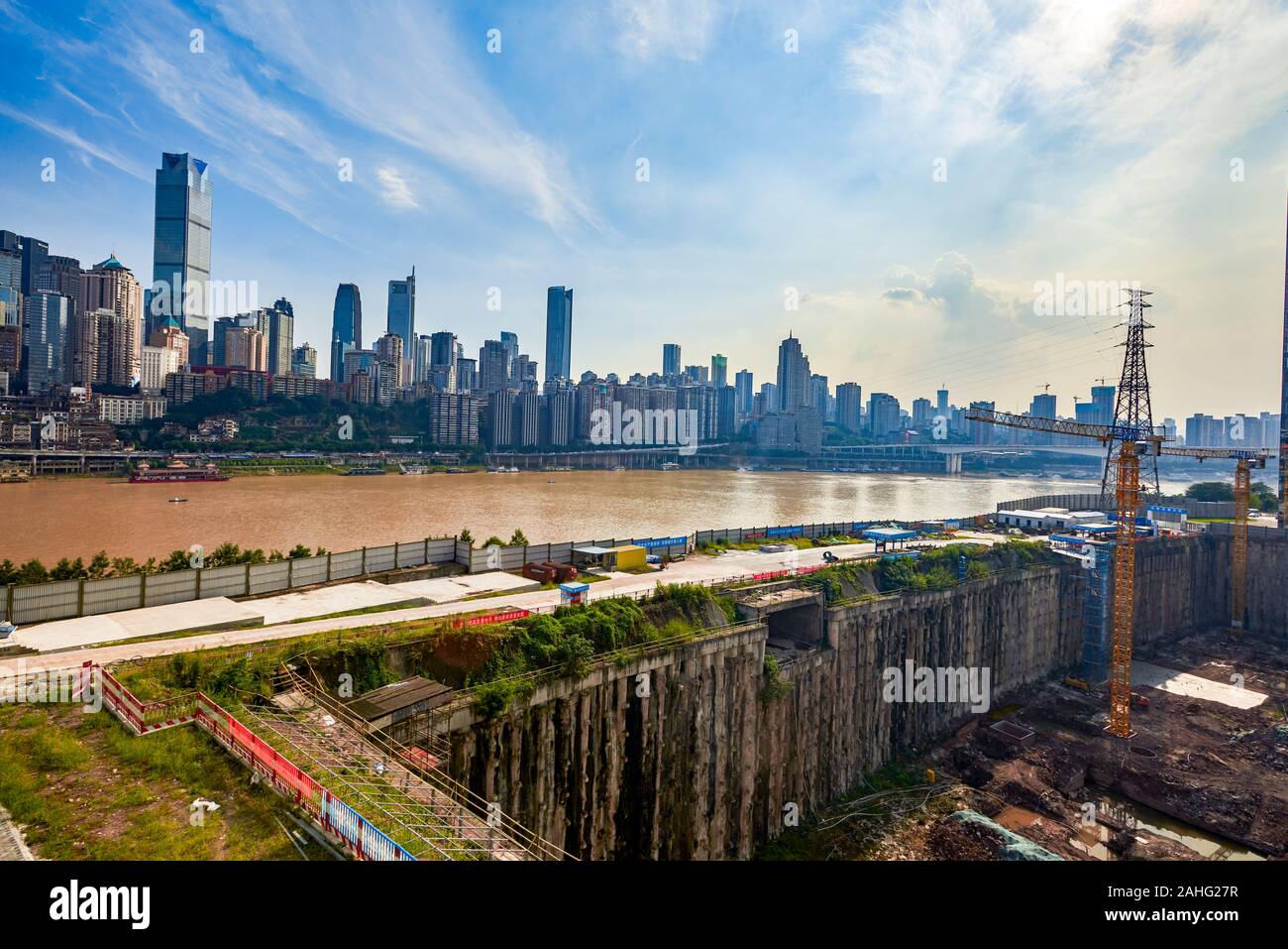 High-rise buildings and construction sites along the Yangtze River in Chongqing Stock Photo