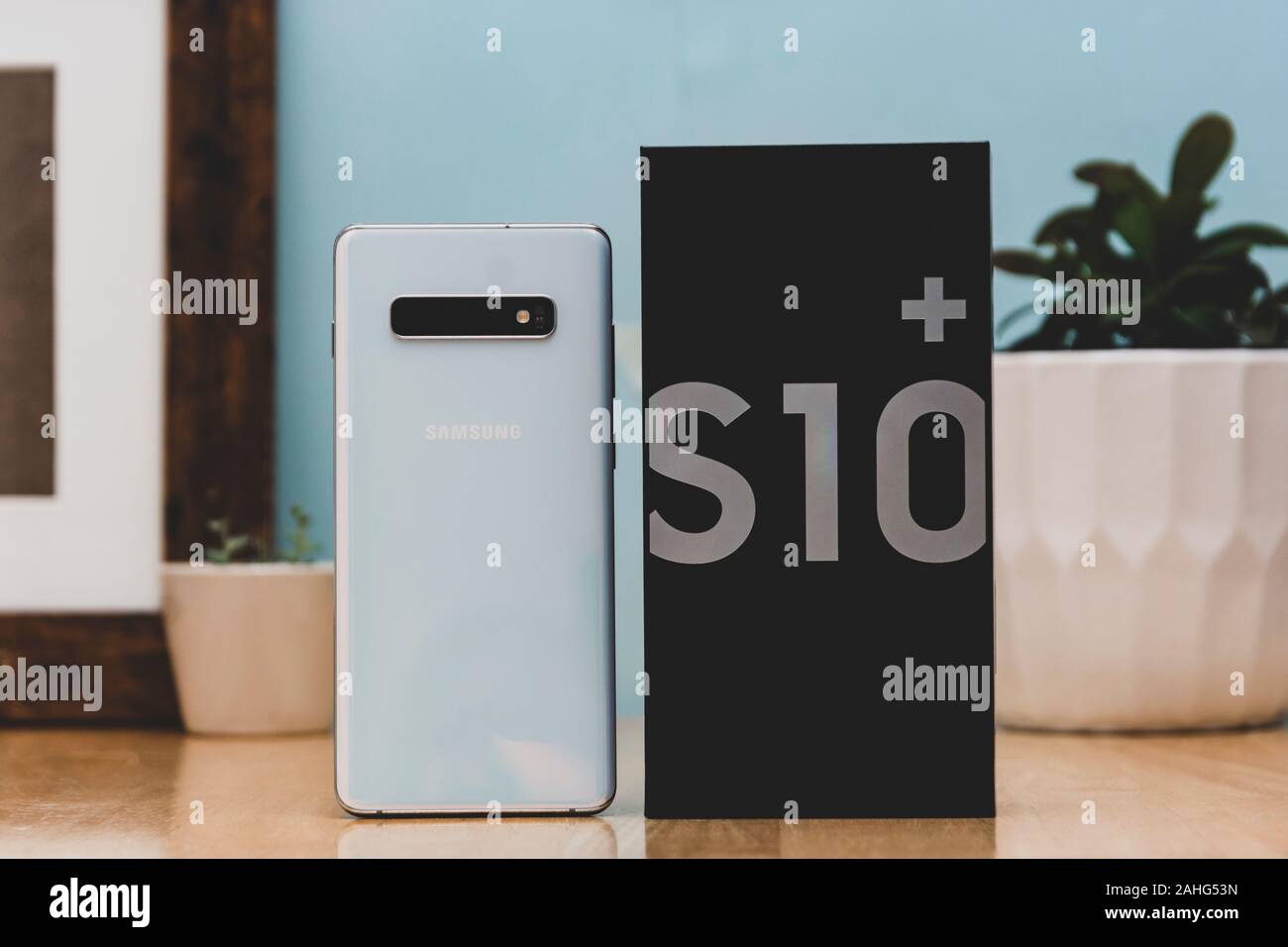 Corby, united Kingdom. December 25, 2019 - Samsung Galaxy S10 mobile phone, announcement of the new Samsung Galaxy S10 white, on blue background. Illu Stock Photo