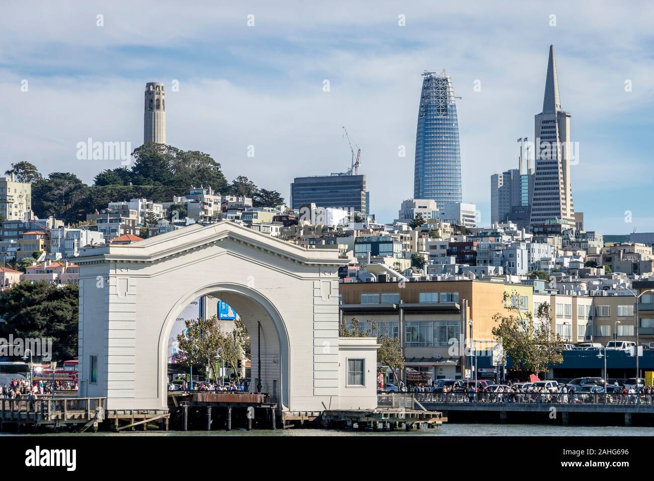 San Francisco view from the bay, including the pier 43 archway , Coit Tower, the Transamerica Pyramid, and Salesforce Tower still under construction Stock Photo