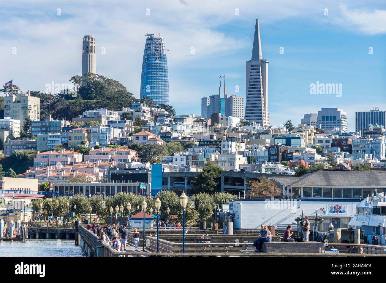 San Francisco cityscape view from the Bay, including the pier, Coit Tower, the Transamerica Pyramid, and Salesforce Tower still under construction Stock Photo