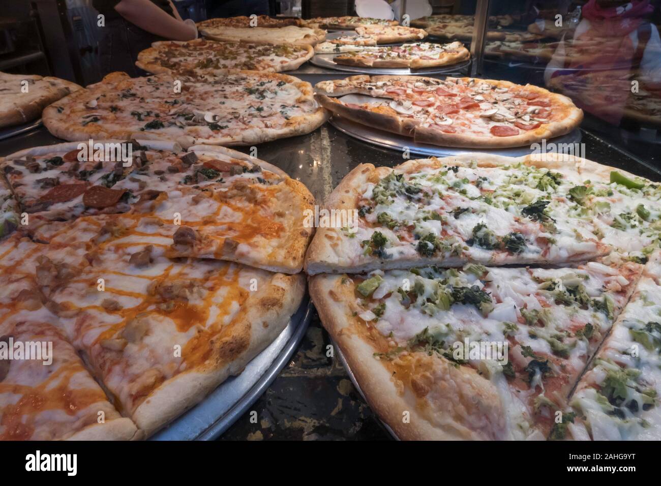 Pizzas, Pizzeria Warming Table and Display Window, Times Square, NYC , USA Stock Photo