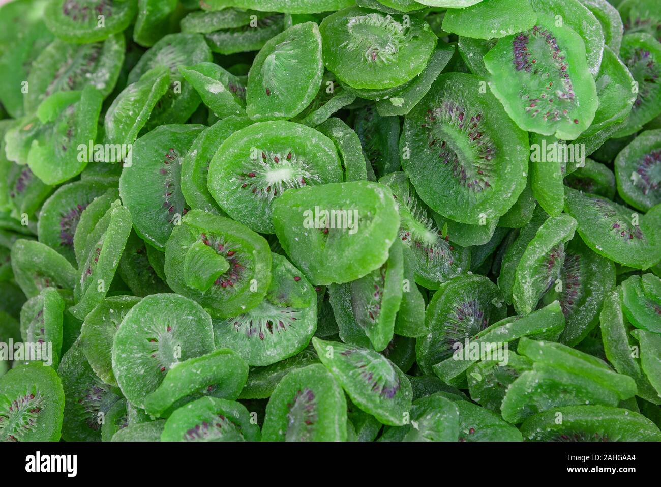 Dried kiwi fruit sugar coated background Dried Kiwi Background Stock