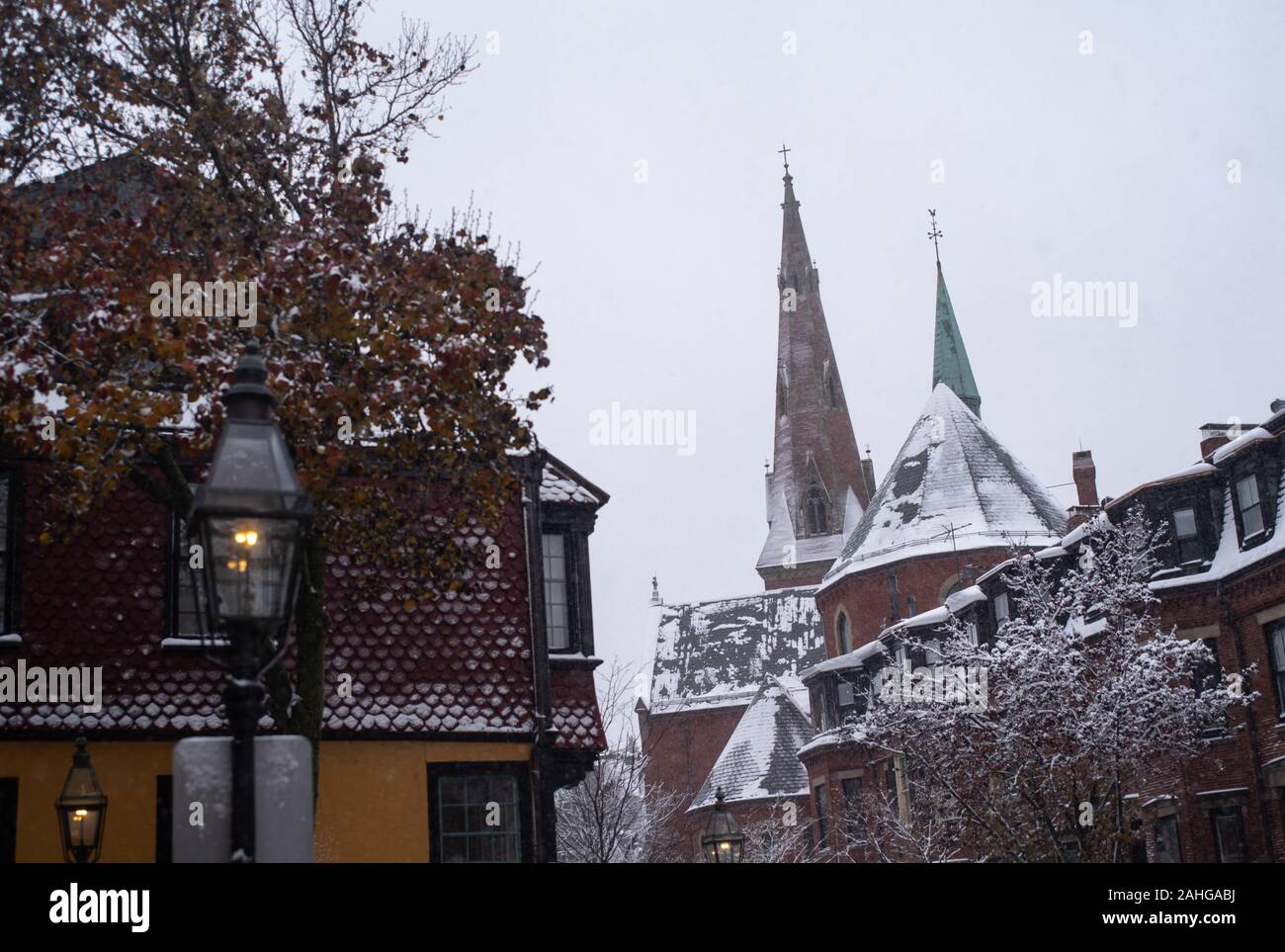 A Boston Church and House in Winter Weather Stock Photo