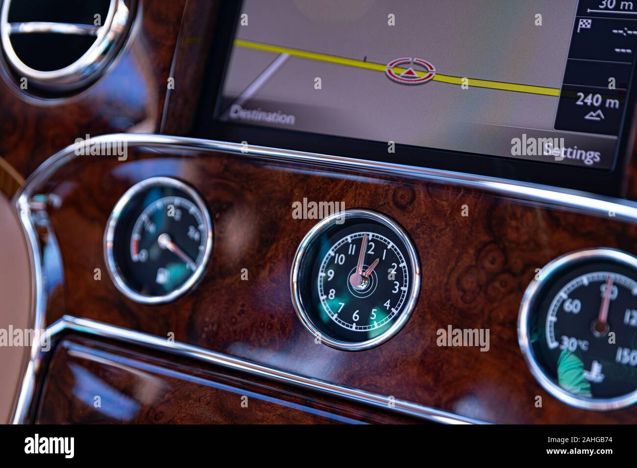 Car analog clock in dashboard Stock Photo Alamy