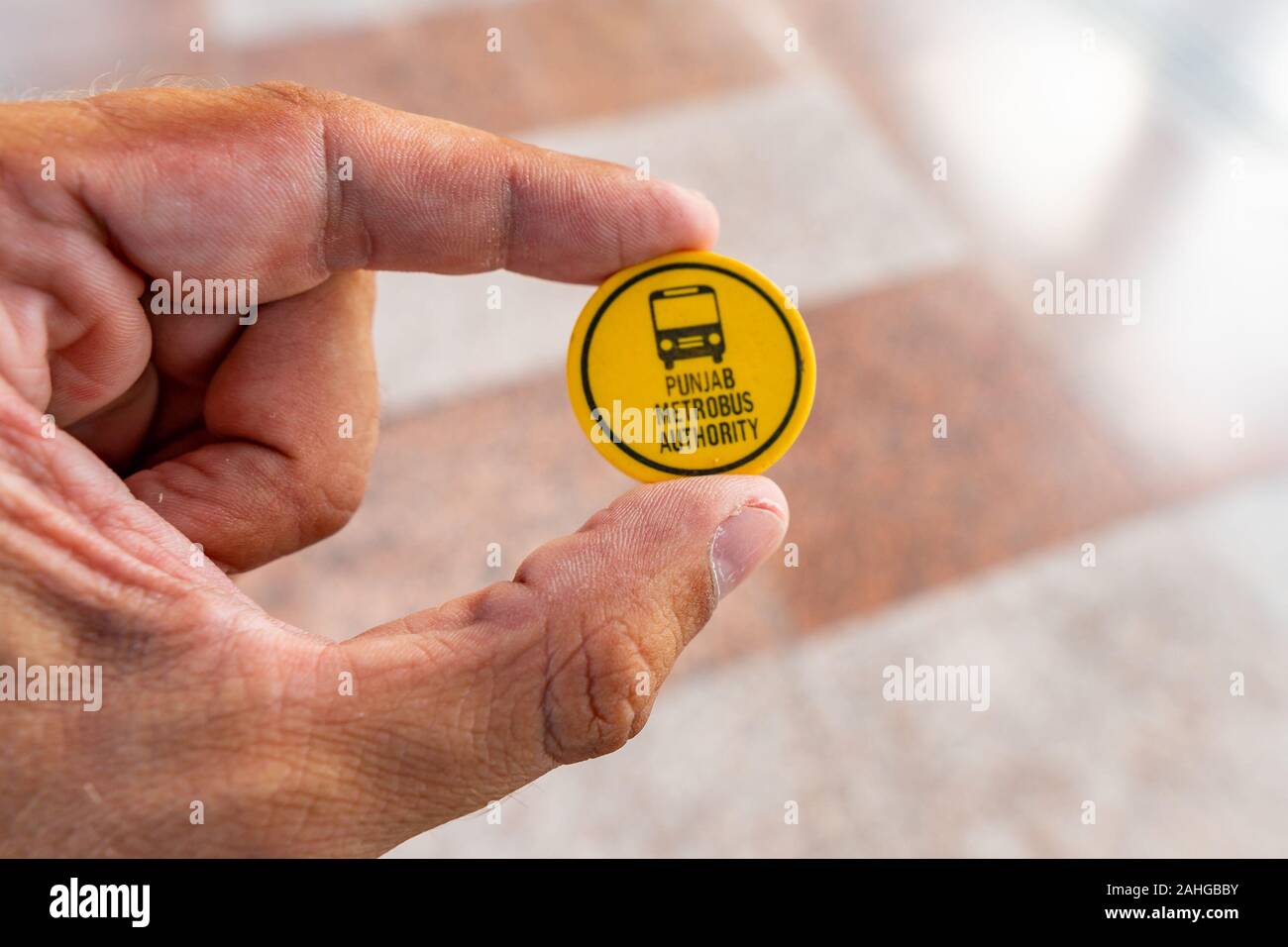 Islamabad Rawalpindi Metro Bus Station Centaurus South at Blue Area Closeup View of Yellow Colored Token Ticket Stock Photo - Alamy Islamabad Rawalpindi Metro Bus Station Centaurus South at Blue Area Closeup View of Yellow Colored Token Ticket Stock Photo - Alamy