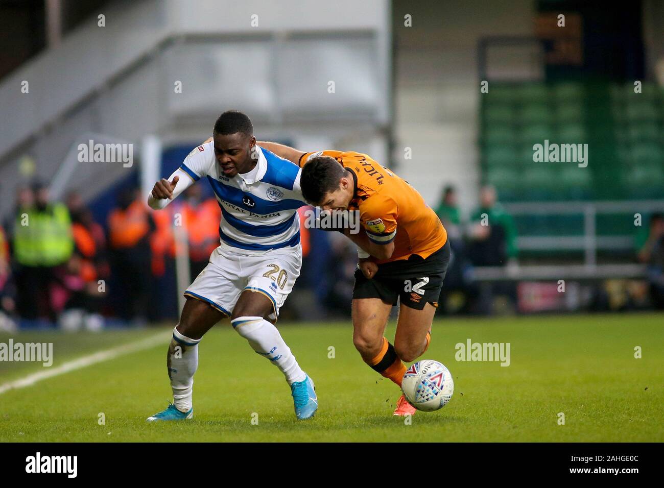 Bright Osayi-Samuel of Queens Park Rangers (l) and Eric Lichaj of Hull City in action during EFL Skybet Championship match, Queens Park Rangers v Hull city at The Kiyan Prince Foundation Stadium, Loftus Road in London on Sunday 29th December 2019. this image may only be used for Editorial purposes. Editorial use only, license required for commercial use. No use in betting, games or a single club/league/player publications. pic by Tom Smeeth/Andrew Orchard sports photography/Alamy Live news Credit: Andrew Orchard sports photography/Alamy Live News Stock Photo