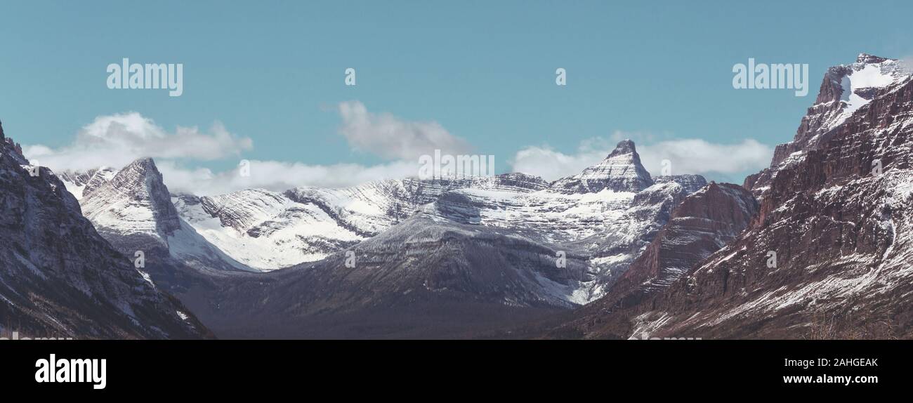 Early winter with first snow covering rocks and woods in the Glacier ...