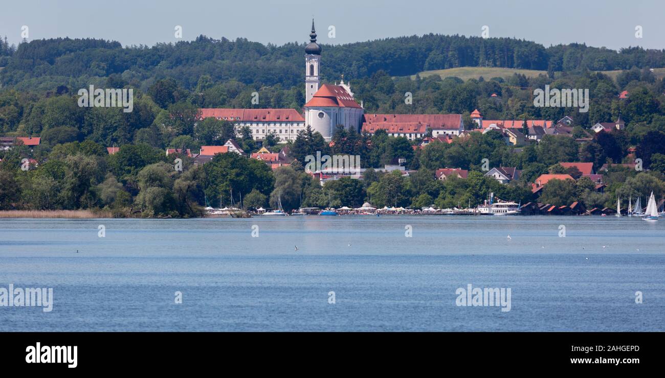 Scenic panorama view of the Marienmünster Dießen (Diessen). Lake Ammersee in the foreground. The construction of the church started in 1720. Stock Photo