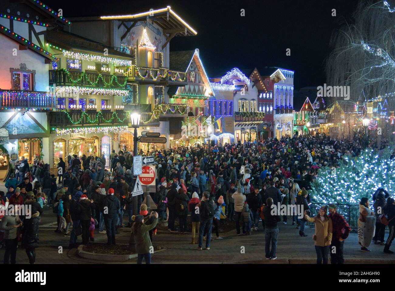 Crowds flock to the Christmas Lighting Festival in Leavenworth, WA--a faux-Bavarian town in the Cascade Mountains and a popular day trip from Seattle. Stock Photo