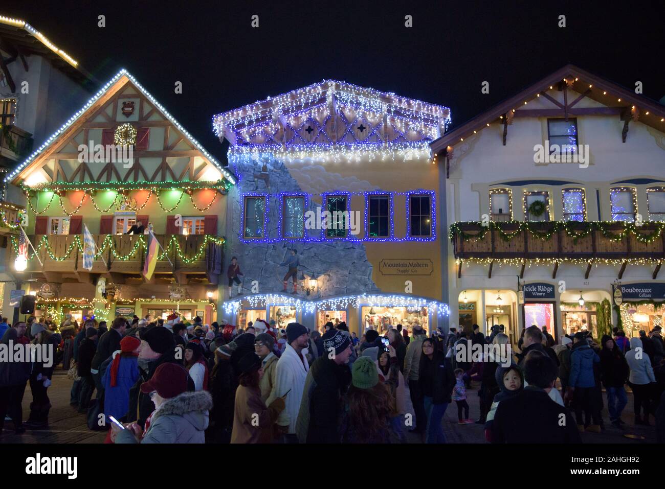 Crowds flock to the Christmas Lighting Festival in Leavenworth, WA--a faux-Bavarian town in the Cascade Mountains and a popular day trip from Seattle. Stock Photo