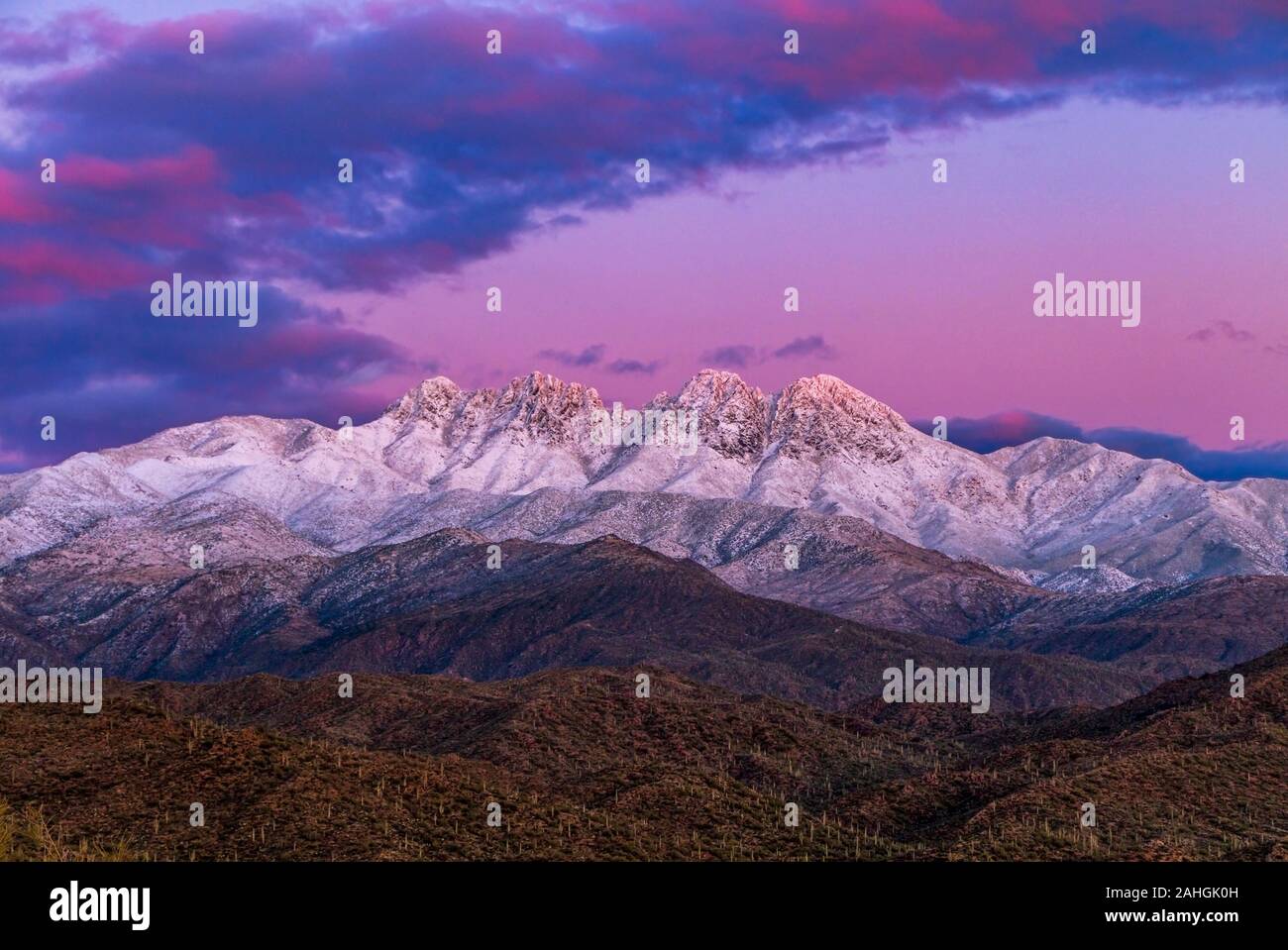 Sunset Image of the Snow Clad Four Peaks Mountain Range Outside Phoenix AZ Stock Photo