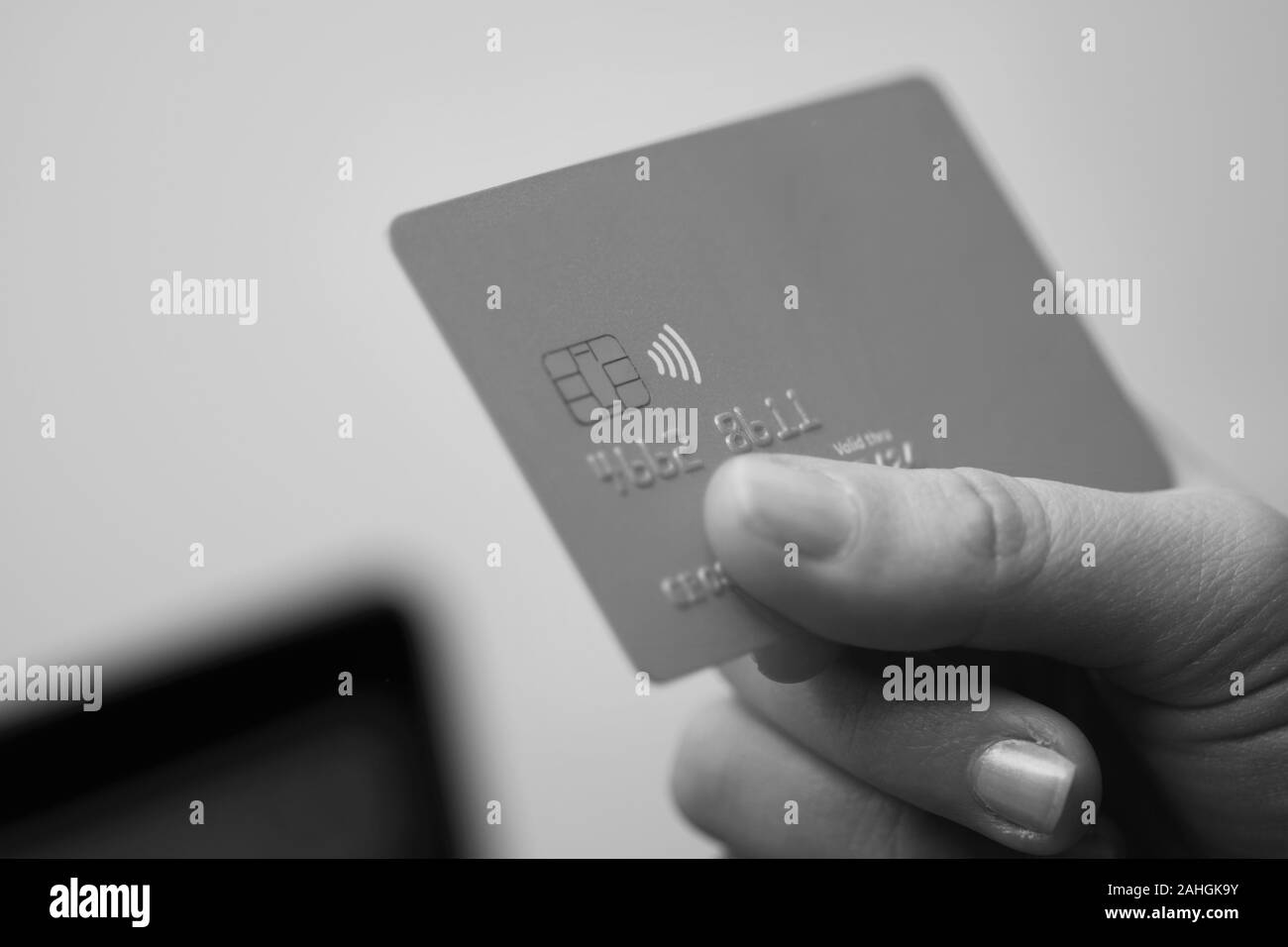 Hands holding credit card - close up Stock Photo