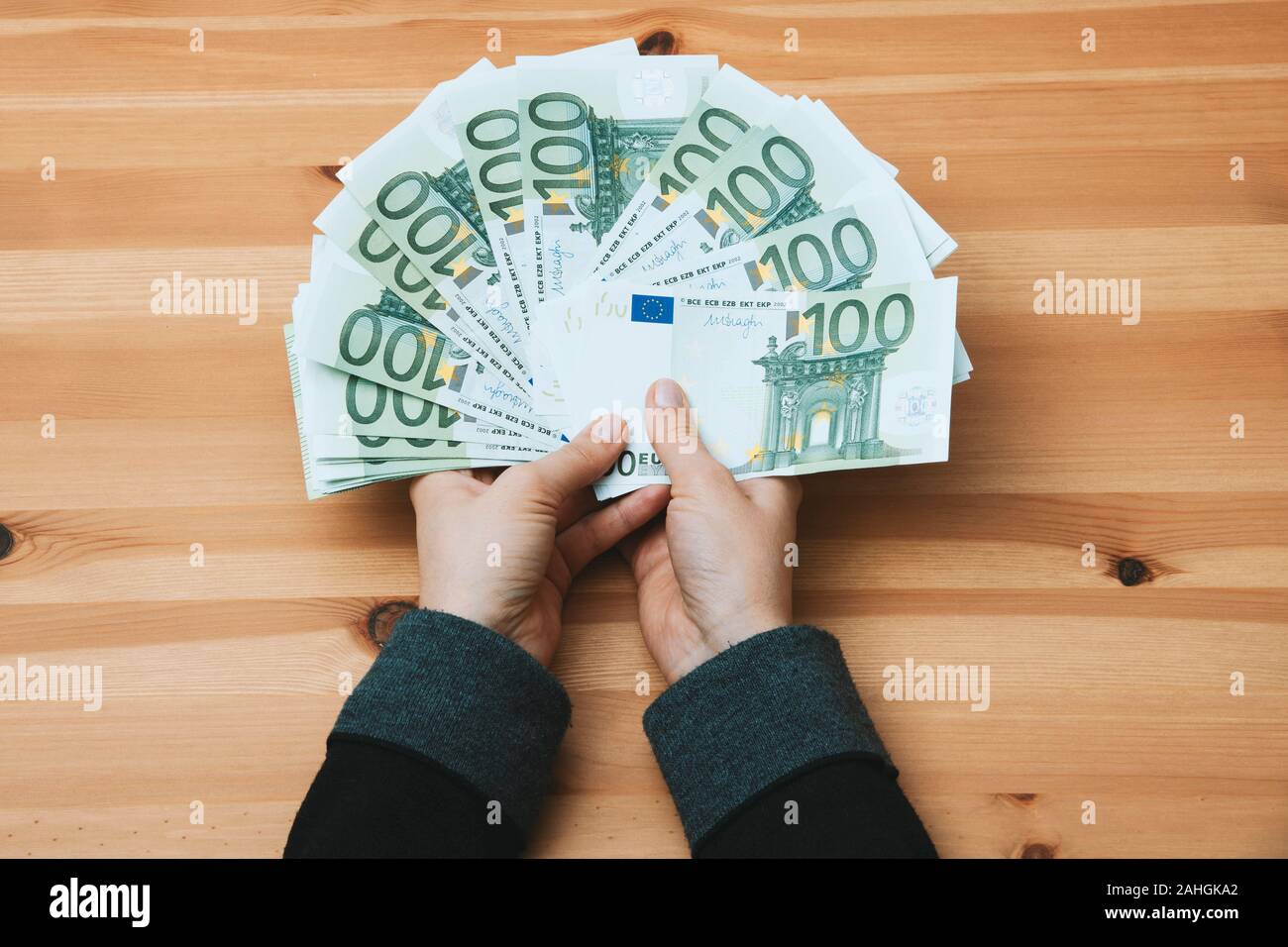 Hand lady holding euro banknotes Stock Photo
