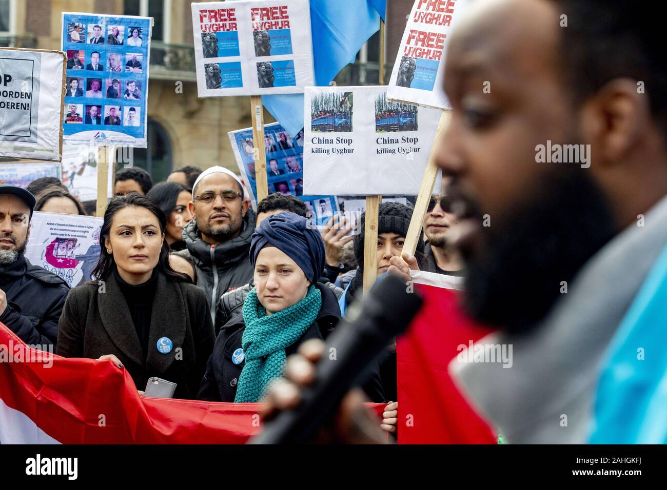 Amsterdam, Netherlands. 18th May, 2019. Protesters hold placards during the demonstration.Uighurs and sympathisers gather at the Dam Square in Amsterdam to show their support with China's ethnic Uighurs and protest against what they see as the oppression of the Uyghurs in China by the government of that country. Credit: Niels Wenstedt/SOPA Images/ZUMA Wire/Alamy Live News Stock Photo