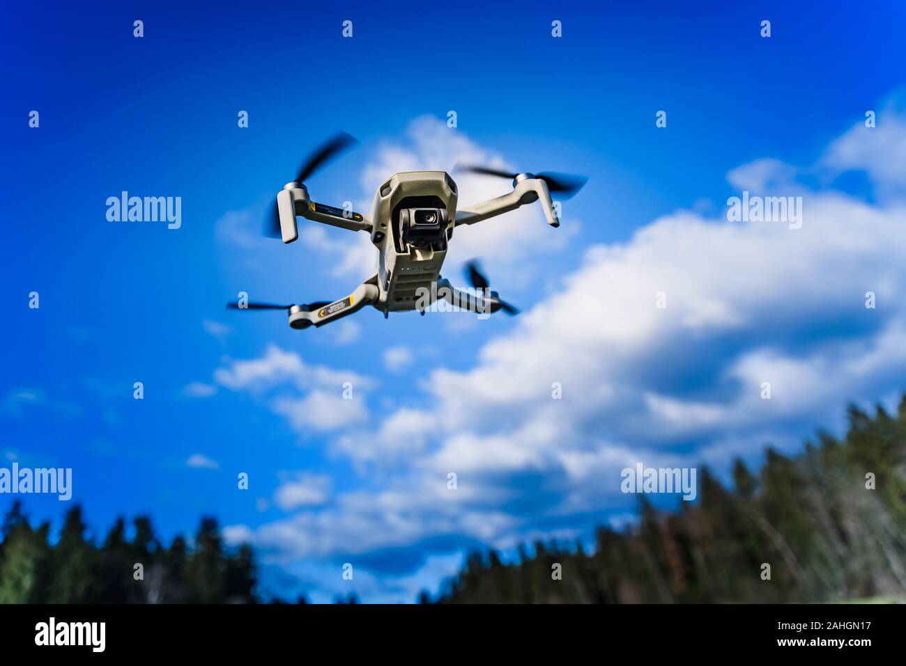 Graz, Austria - December 29 2019. DJI Mavic Mini drone flying in the  countryside above frozen lake on sunny winter day Stock Photo - Alamy