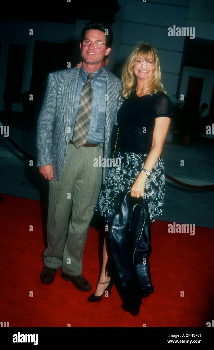 Burbank, California, USA 30th May 1995 Actor Kurt Russell and actress Goldie Hawn attend Warner Bros. Pictures' 'The Bridges of Madison County' Premiere on May 30, 1995 at the Steven J. Ross Theater, Warner Bros. Studios in Burbank, California, USA. Photo by Barry King/Alamy Stock Photo Stock Photo