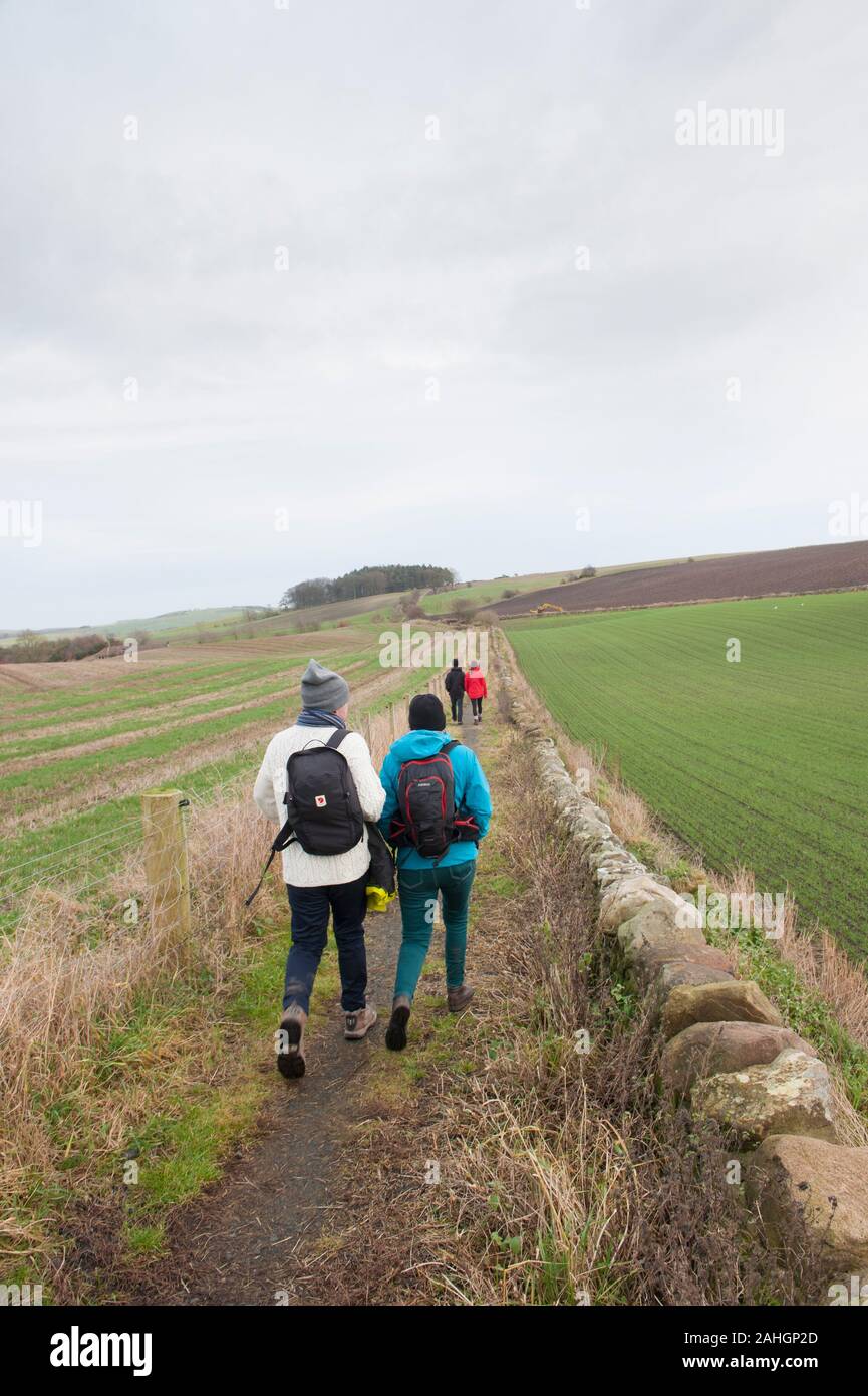 Walkers on the Fife Pilgrim Way between Ceres and St Andrews in Fife, Scotland, UK Stock Photo