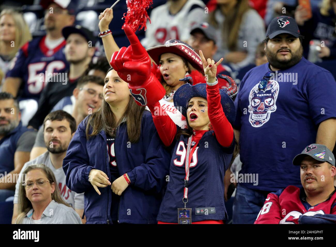 Houston Texans fans cheer in the stands during the second half of