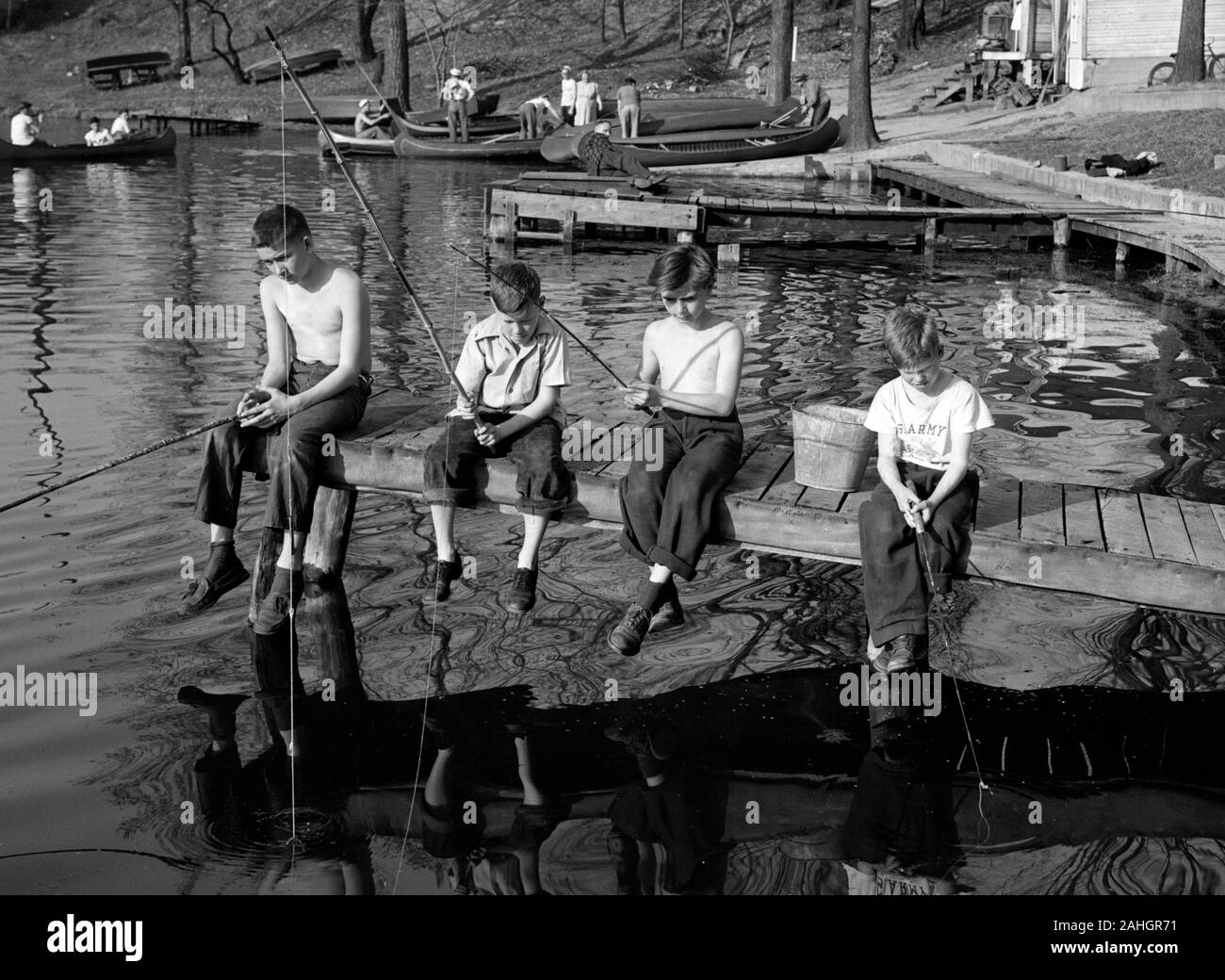 Children fishing 1946 Stock Photo