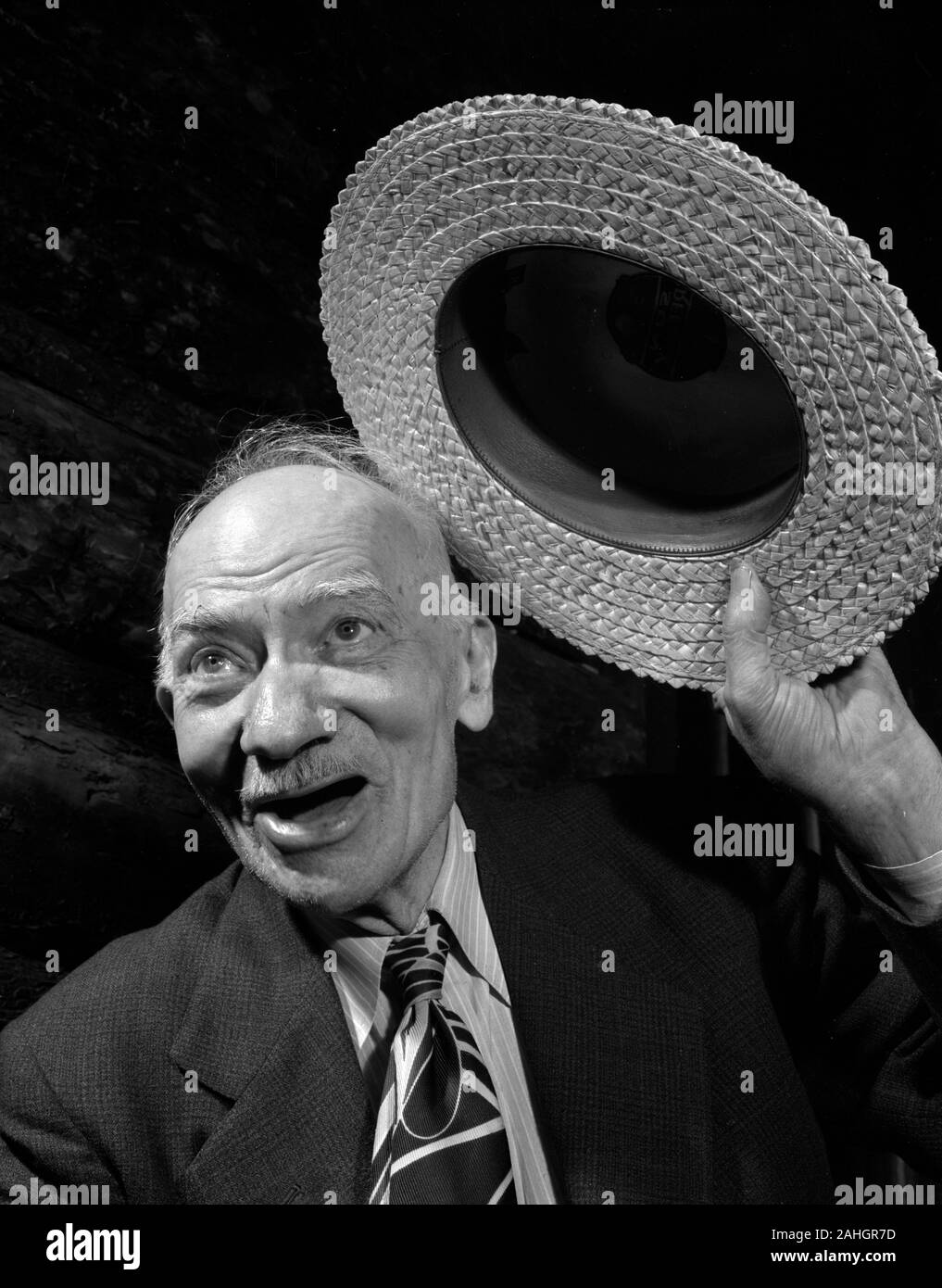 An elderly man with a straw hat, 1946 Stock Photo