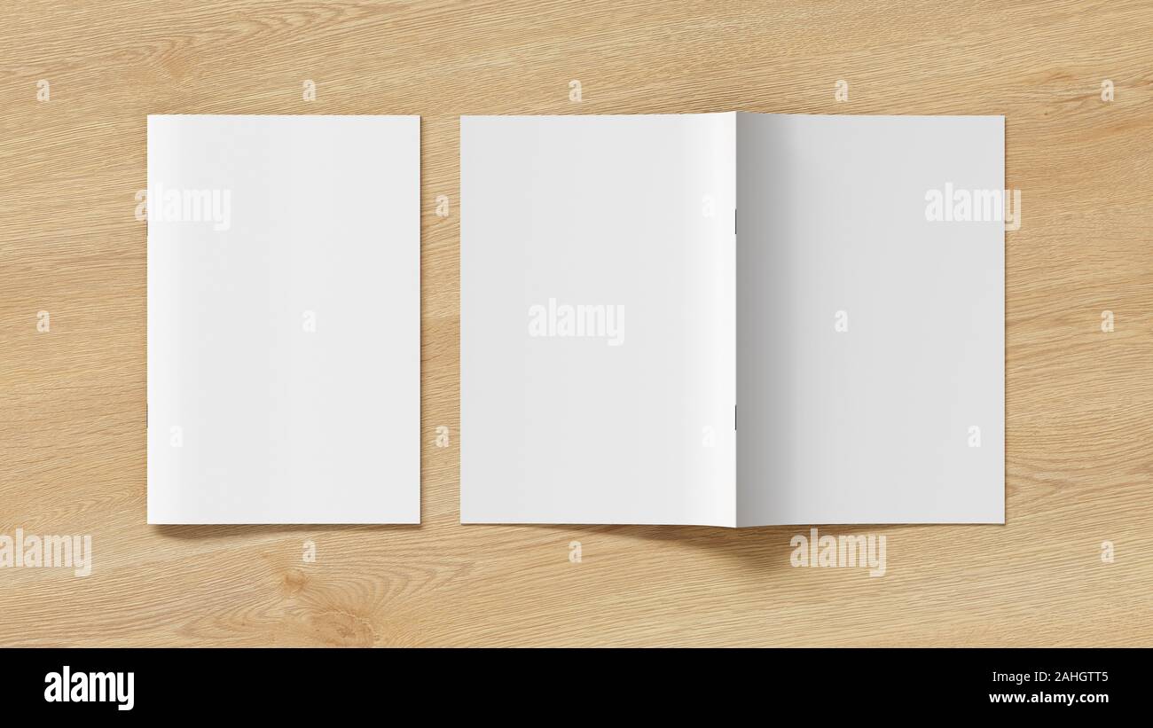 Vertical brochure or booklet cover mock up on wooden background. Closed one brochure and upside