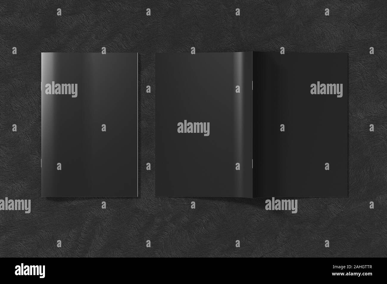 Black brochure or booklet cover mock up on black background. Closed one brochure and upside down