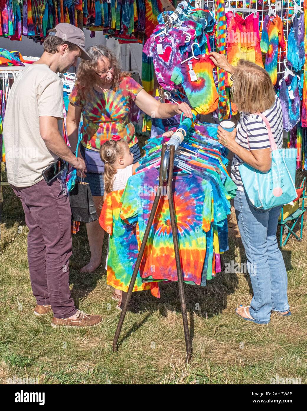 Shopping for clothes at a country fair Stock Photo