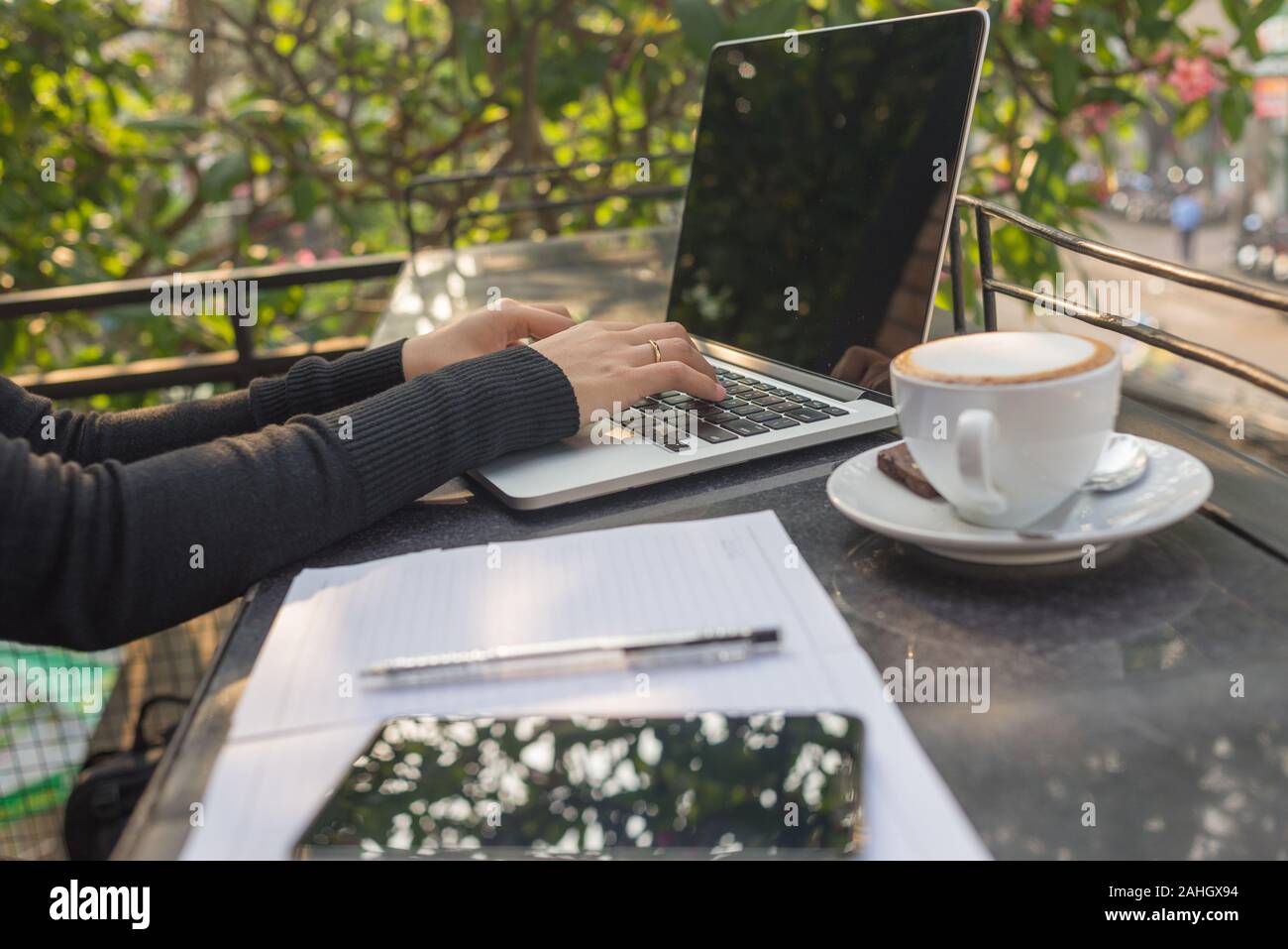 Freelancer woman hands using laptop Stock Photo