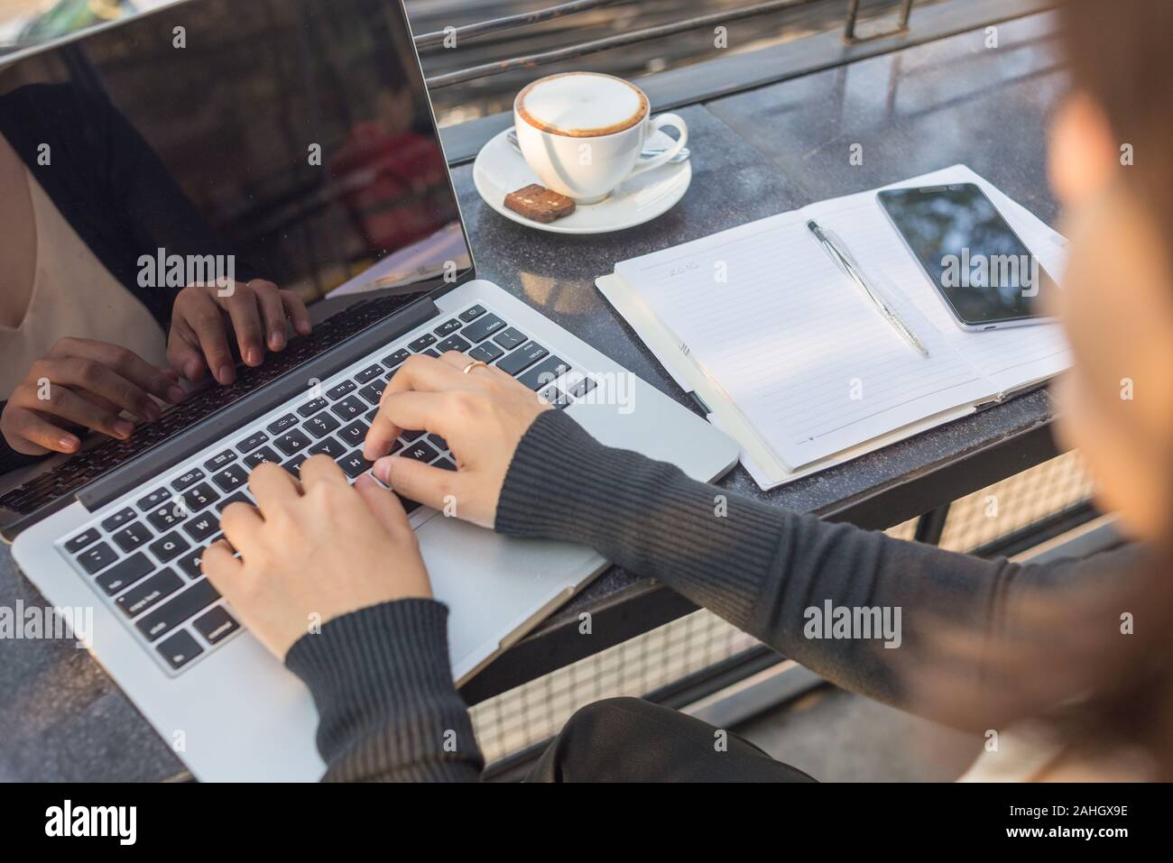 Professional using computer outdoor hi-res stock photography and images ...