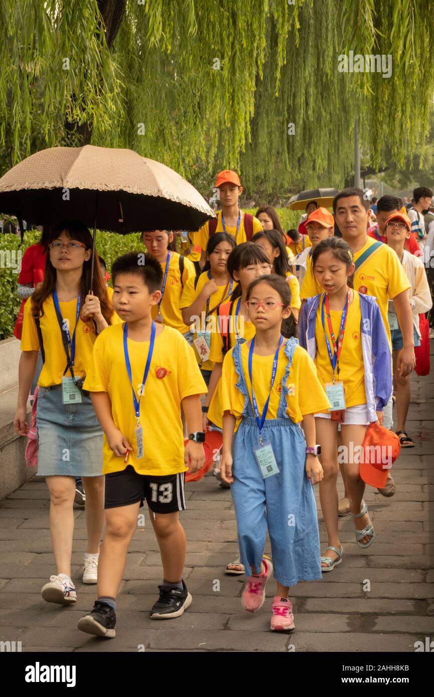 Chinese schoolchildren on a field trip to the Forbidden City, Beijing, China Stock Photo