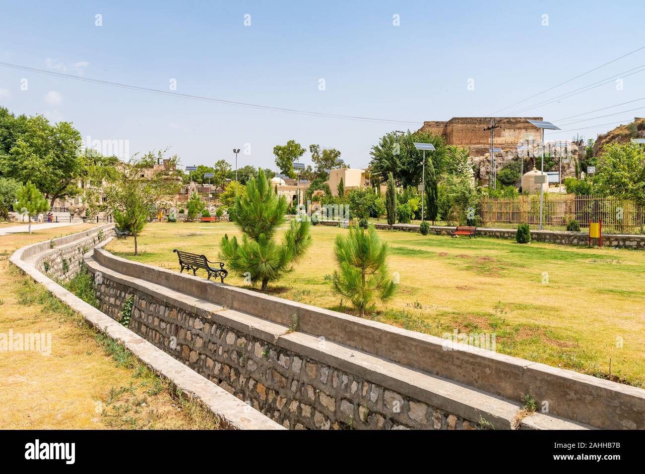 Chakwal Qila Katas Raj Hindu Temples Dedicated to Shiva Picturesque View of a Canal on a Sunny Blue Sky Day Stock Photo
