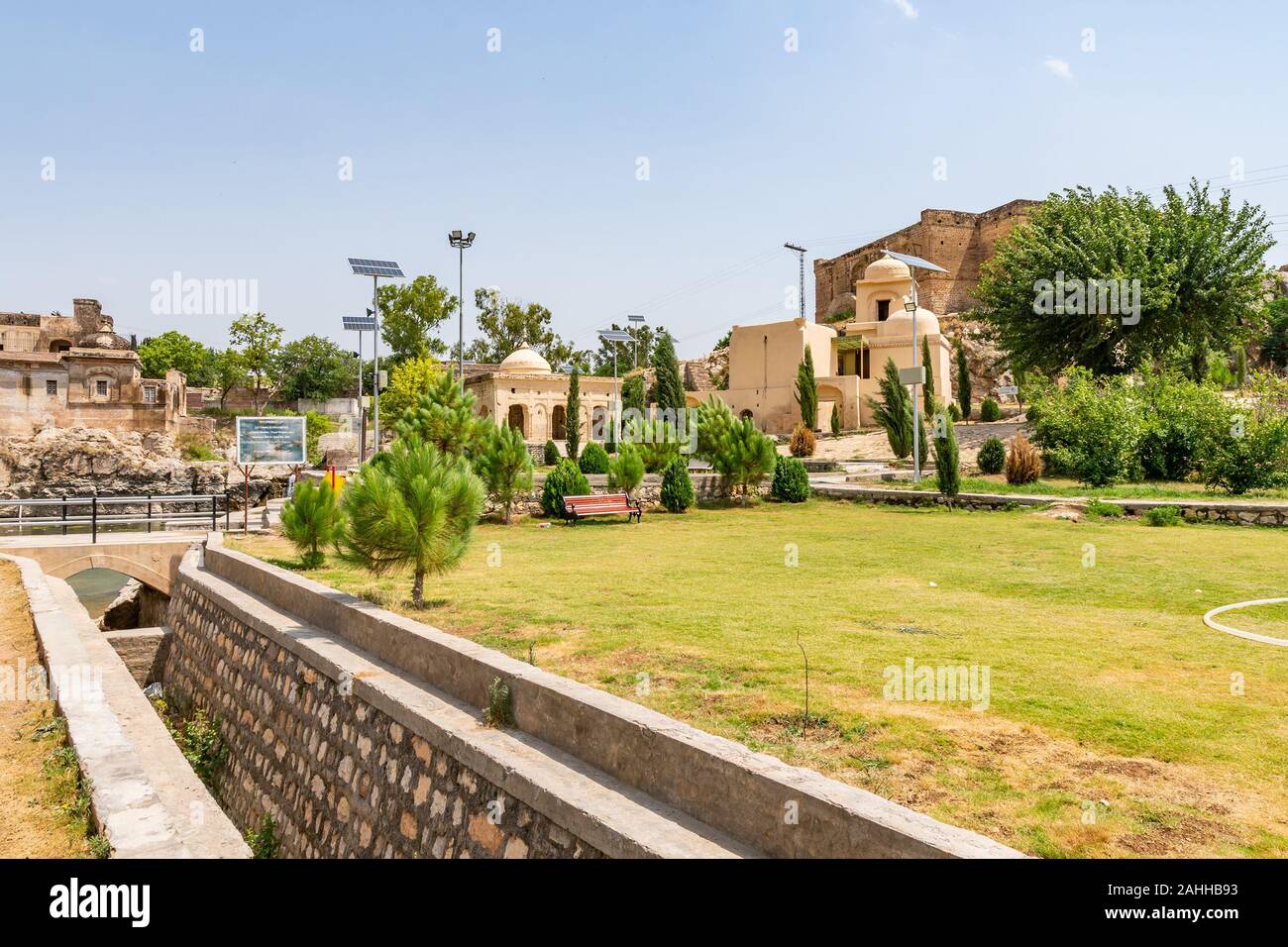 Chakwal Qila Katas Raj Hindu Temples Dedicated to Shiva Picturesque View of a Canal on a Sunny Blue Sky Day Stock Photo