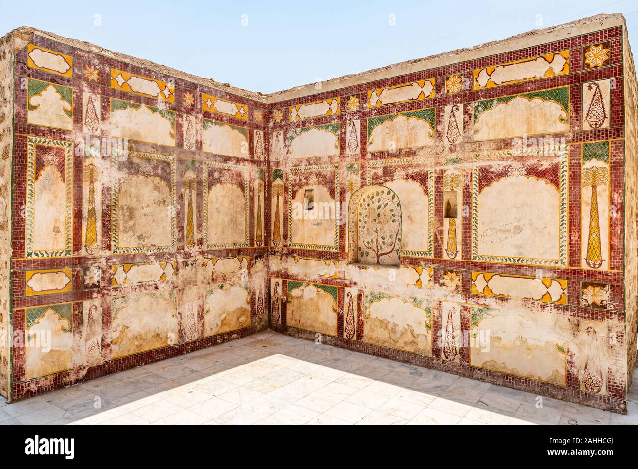 Chakwal Qila Katas Raj Hindu Temples Dedicated to Shiva Picturesque View of a Painted Wall on a Sunny Blue Sky Day Stock Photo