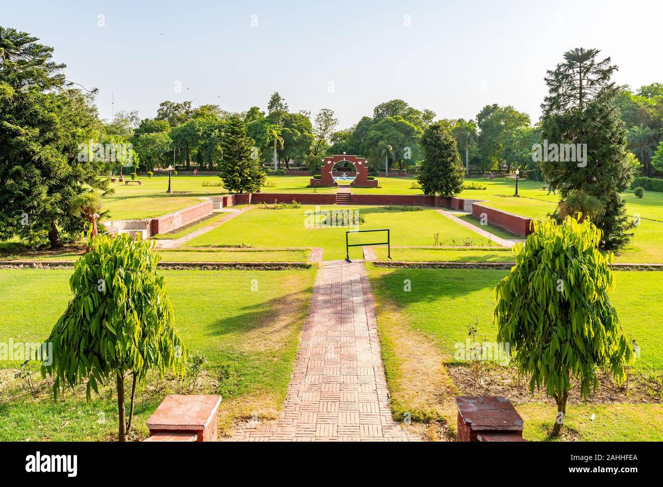 Lahore Bagh-e-Jinnah Park Picturesque View of Garden with Trees on a Sunny Blue Sky Day Stock Photo