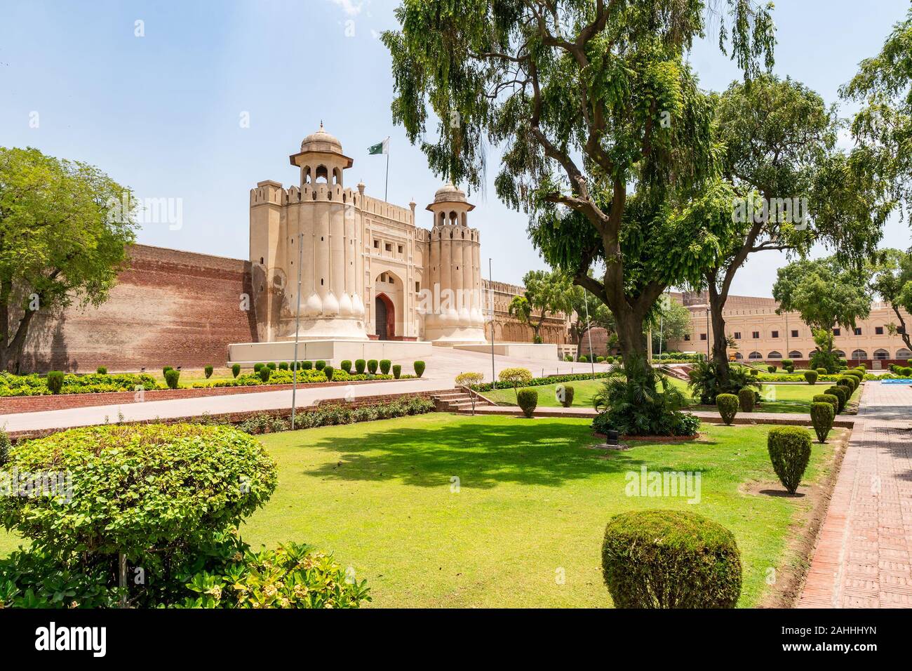 Lahore Fort Picturesque Breathtaking View of Alamgiri Gate with Waving Pakistan Flag on a Sunny Blue Sky Day Stock Photo