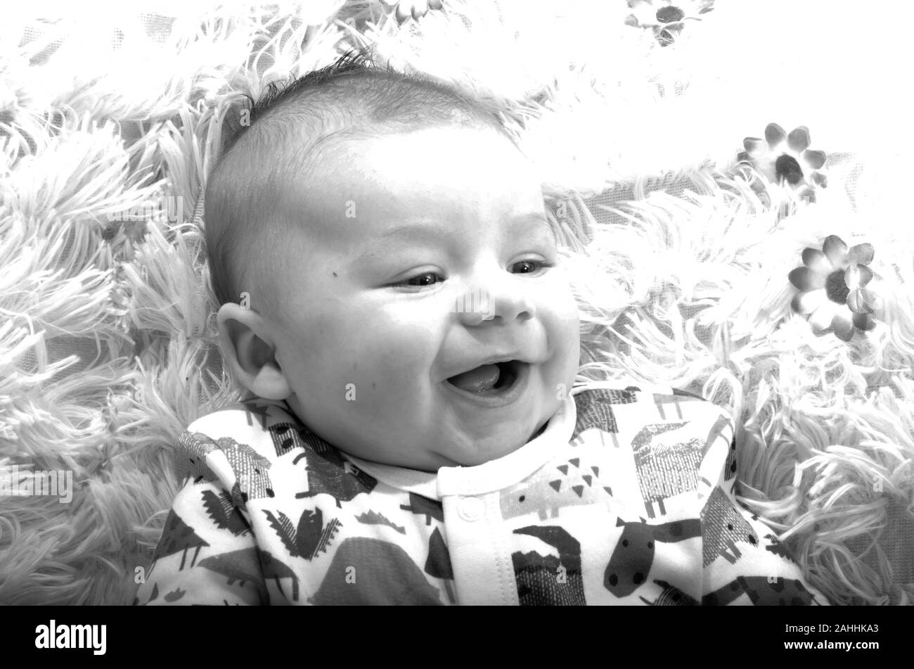 Baby laughing, happy Infant Stock Photo