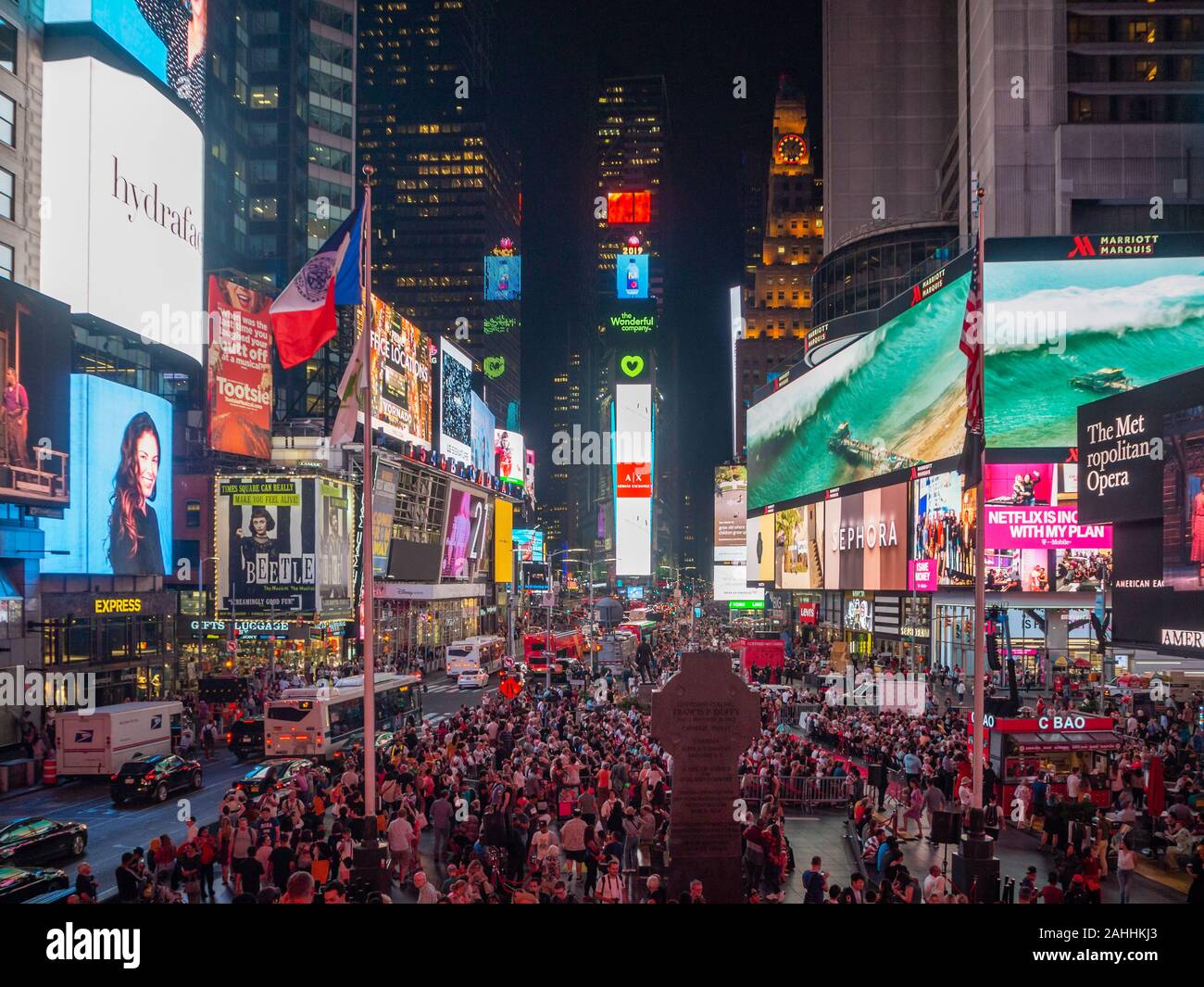 Midtown Manhattan, New York City, United States of America [ Times Square, crowded crossroad on Broadway, tourist attraction with advertisements ] Stock Photo