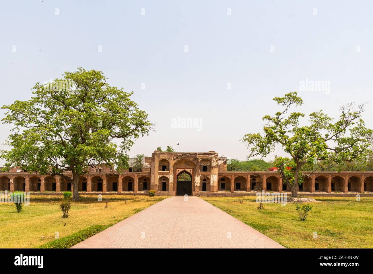 Lahore Shahdara Bagh Jahangir's Tomb Picturesque View of Corridor Walkway and Garden on a Sunny Blue Sky Day Stock Photo