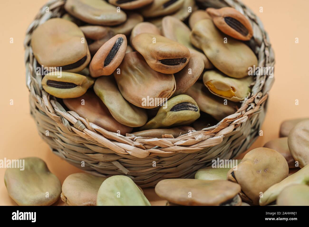 Healthy organic dried broad beans in a straw basket Stock Photo Alamy