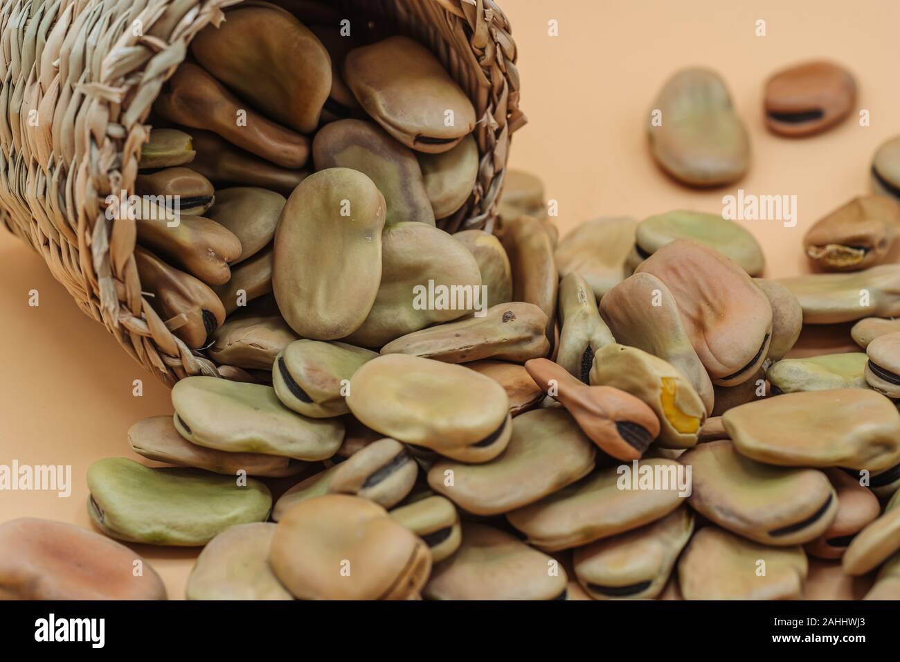 Healthy organic dried broad beans in a straw basket Stock Photo Alamy