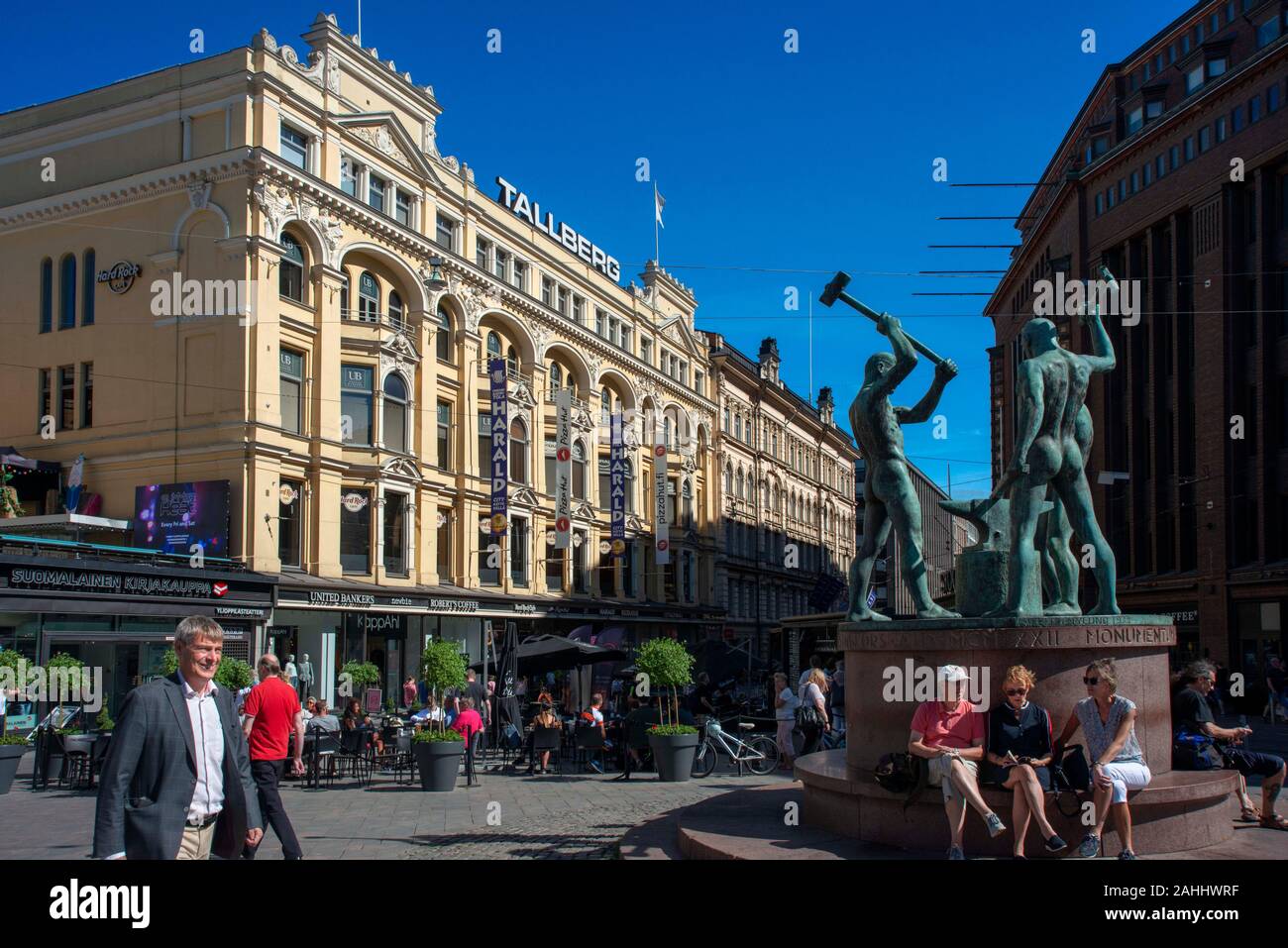Three Smiths Statue, Aleksanterinkatu and Mannerheimintie streets, Helsinki, Etela Suomi Province, Finland, Europe Stock Photo