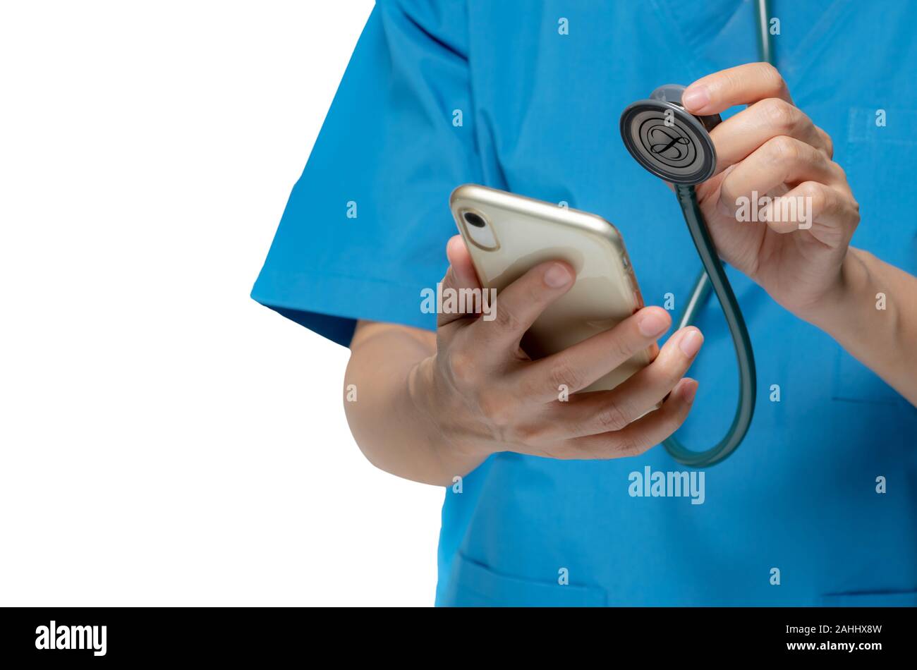 Doctor checkup mobile phone by stethoscope for fix or repair and maintenance smartphone concept. Medical healthcare application concept. Checking Stock Photo